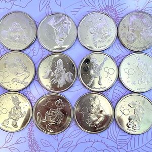 Disney’s 50th anniversary medallion coins set of 12